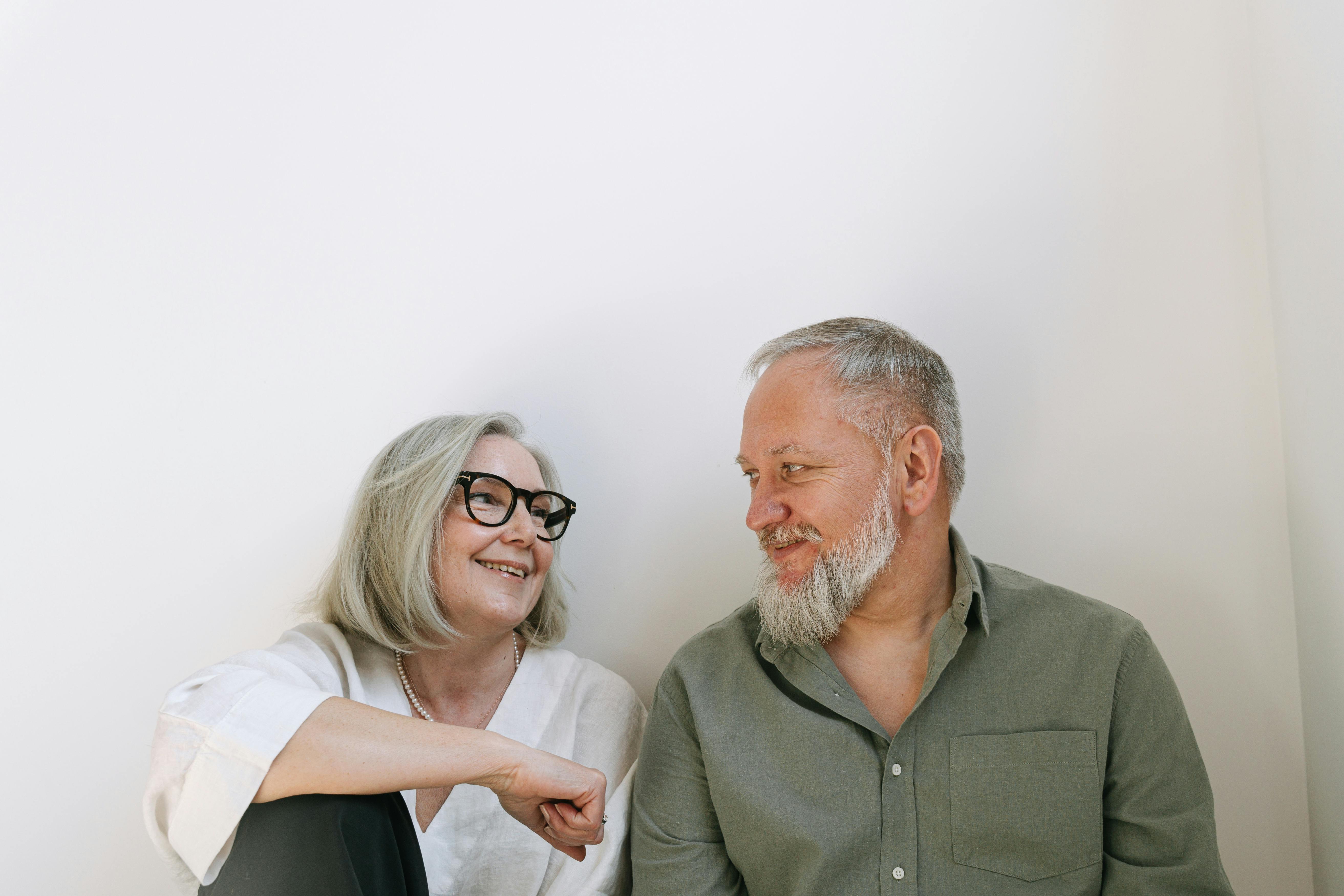 Happy couple discussing Medicare options